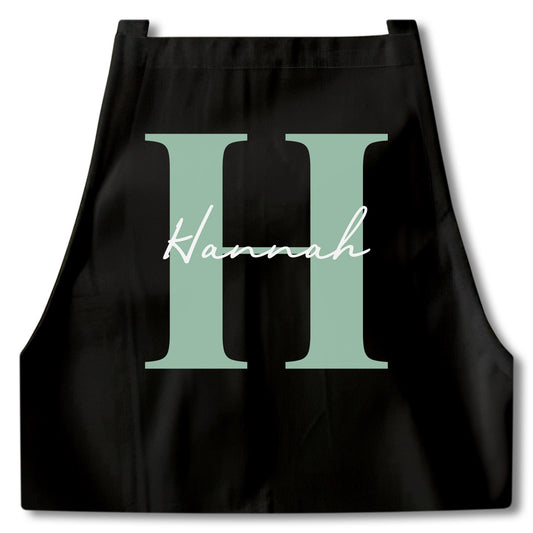 Kochschürze Damen Schürze personalisiert Geschenk für Mama Oma Frauen Küchenschürze Buchstabe Überwurfschürze Backschürze Schwarz